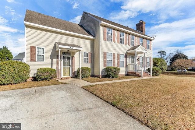 1119 Granbys Run, Salisbury, MD 21804 - colonial house featuring a chimney and a front yard
