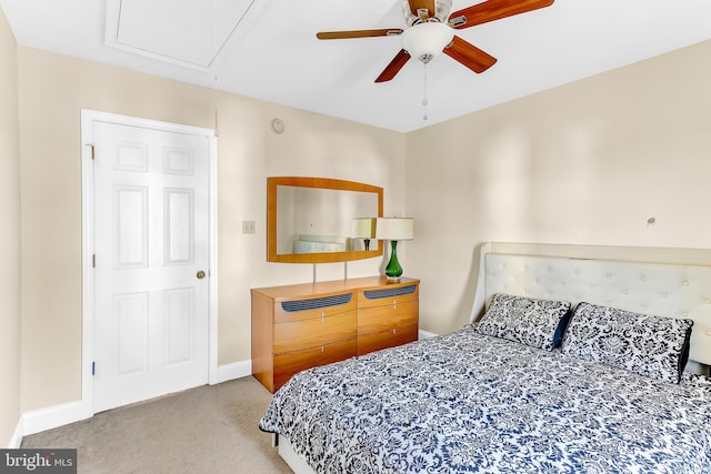 carpeted bedroom with ceiling fan