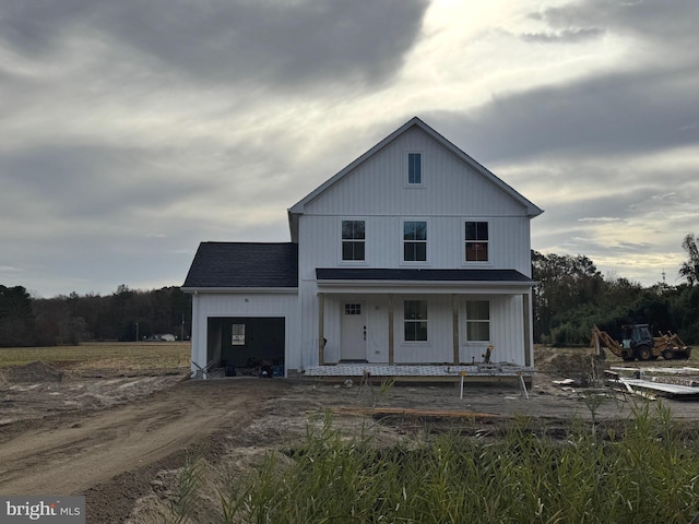 modern farmhouse featuring covered porch