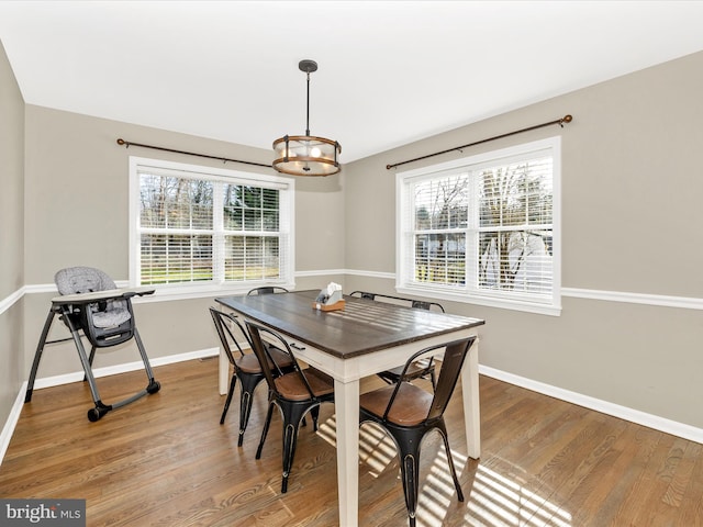 dining area featuring hardwood / wood-style flooring