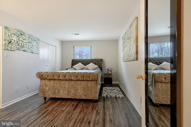 bedroom featuring dark wood-type flooring