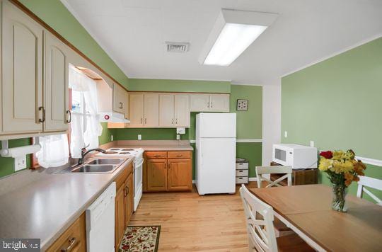 kitchen featuring ventilation hood, white appliances, sink, and light hardwood / wood-style flooring