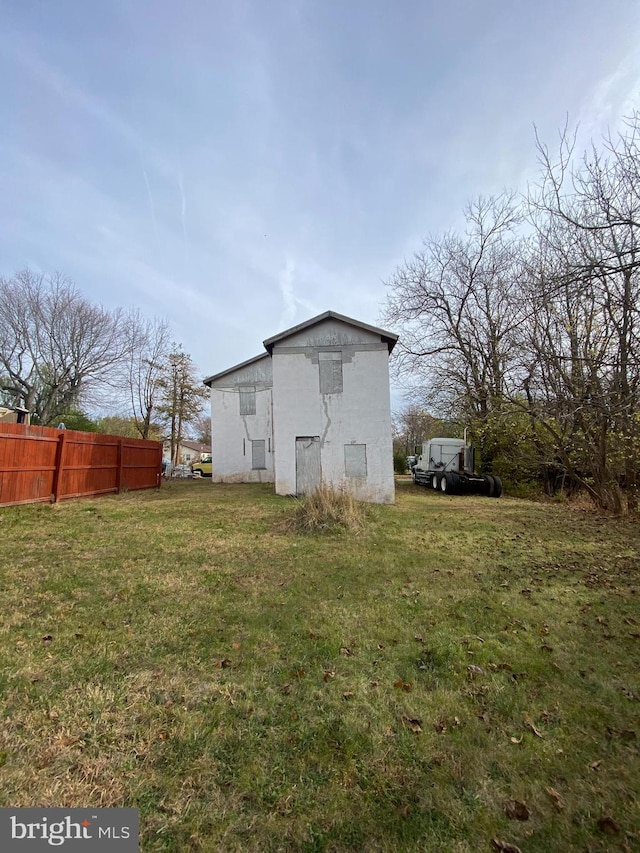 view of home's exterior featuring a lawn