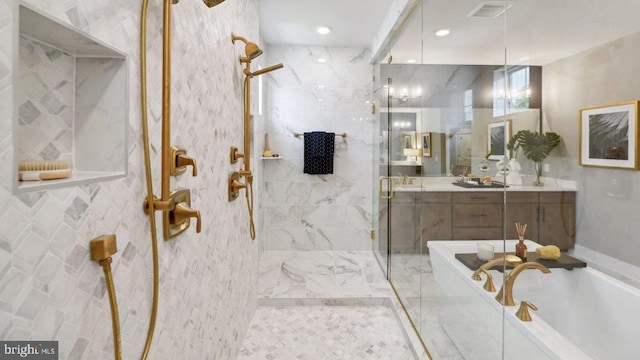 bathroom with independent shower and bath, vanity, and tile walls