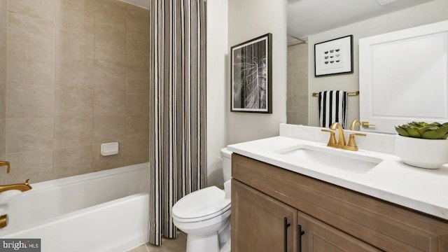 full bathroom featuring shower / bath combo with shower curtain, vanity, and toilet