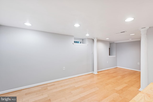 basement featuring light wood-type flooring