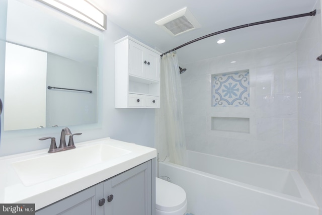 full bathroom featuring vanity, toilet, and shower / bathtub combination with curtain