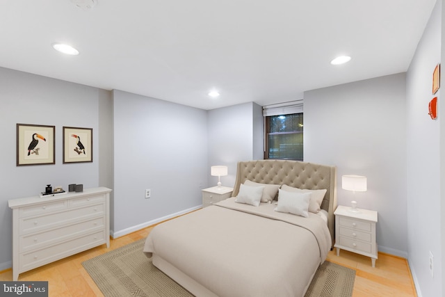 bedroom with light hardwood / wood-style floors