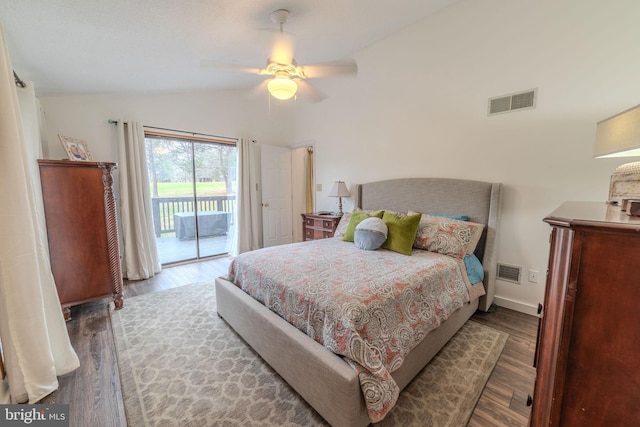 bedroom with access to exterior, dark hardwood / wood-style floors, ceiling fan, and lofted ceiling