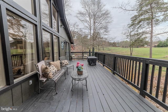 wooden deck featuring outdoor lounge area