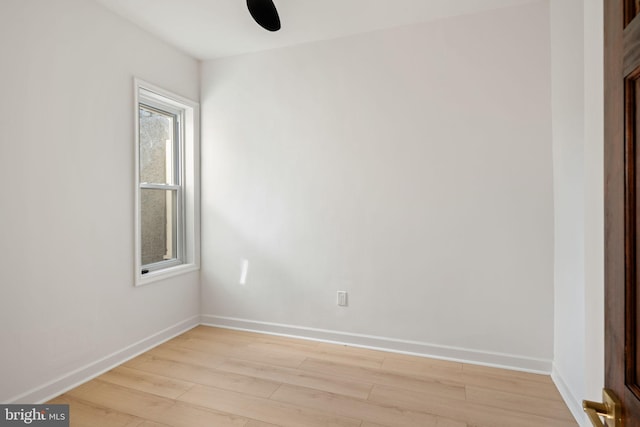 spare room featuring light wood-type flooring