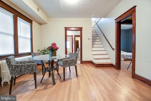 dining room featuring light hardwood / wood-style floors