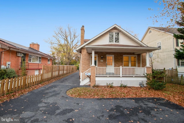 bungalow-style home featuring a porch