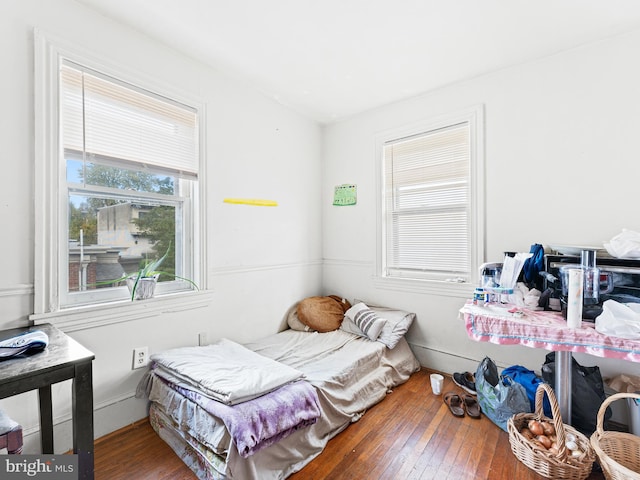 bedroom with wood-type flooring