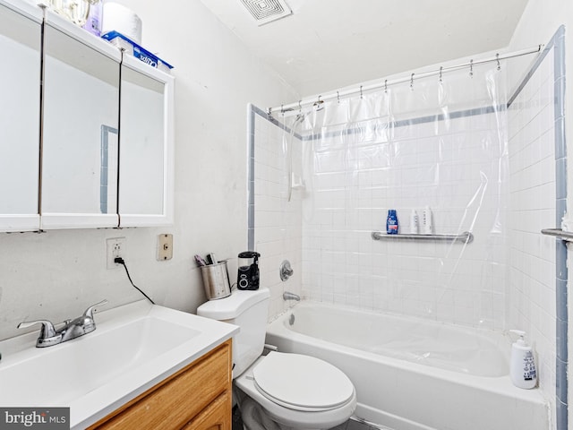 full bathroom with shower / bath combo, vanity, and toilet