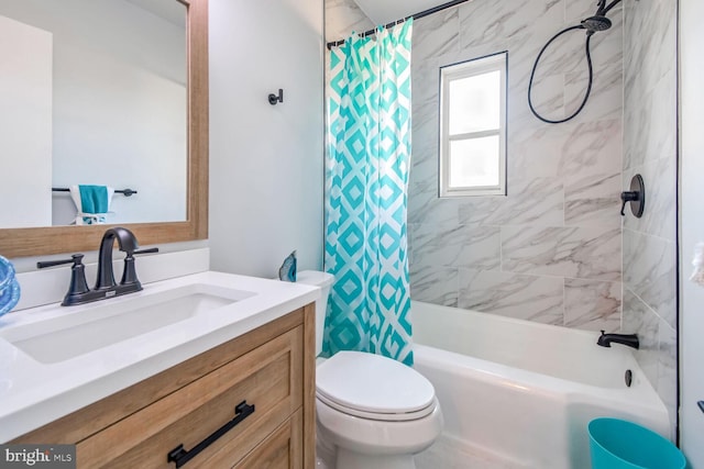 full bathroom with shower / bath combo with shower curtain, vanity, and toilet