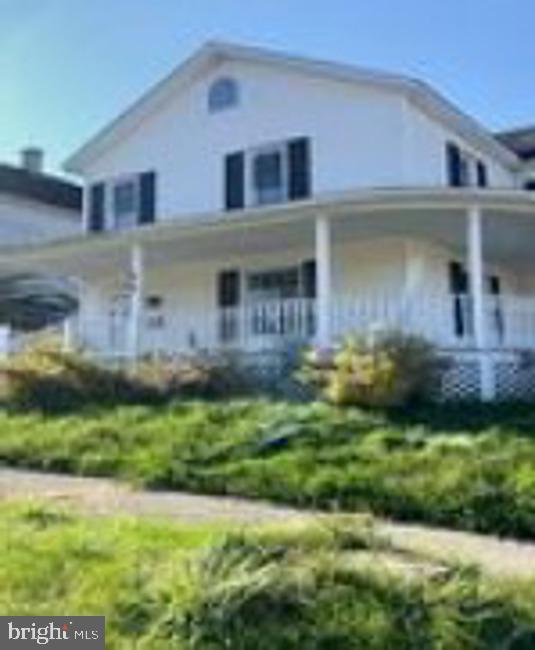 view of front of home featuring covered porch