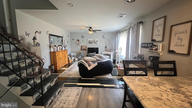 14 Buttonwood Rd, Stratford, NJ 08084 - living area featuring ceiling fan, wood finished floors, and stairway