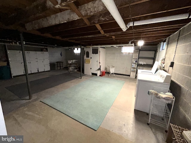 basement featuring separate washer and dryer