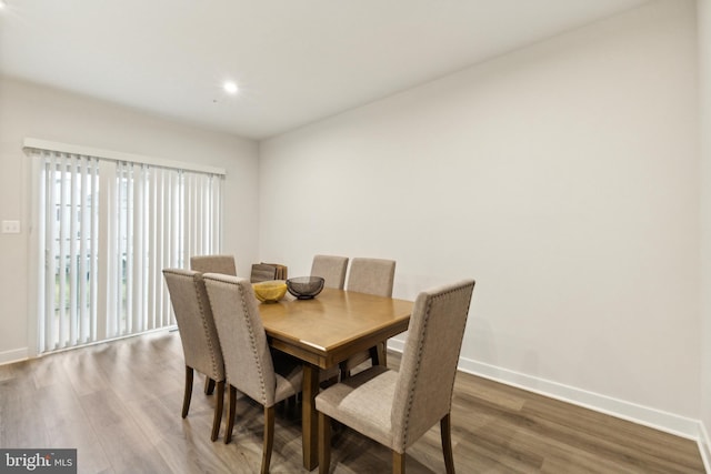 dining area featuring wood-type flooring