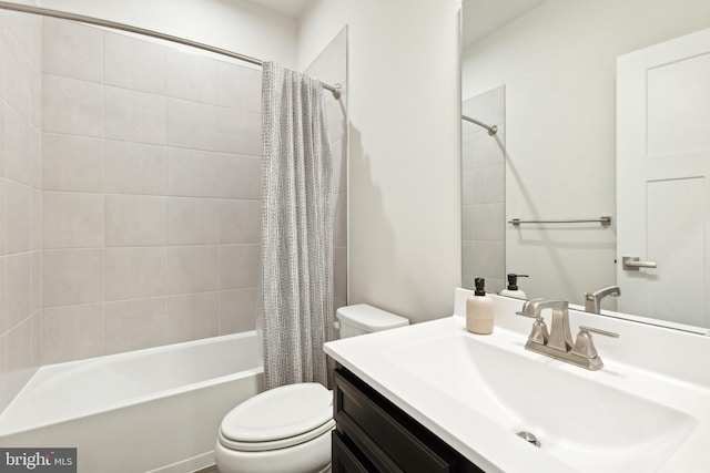 full bathroom with shower / bath combo, vanity, and toilet