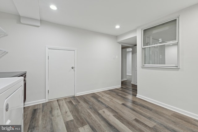 laundry area featuring washer / clothes dryer and hardwood / wood-style flooring