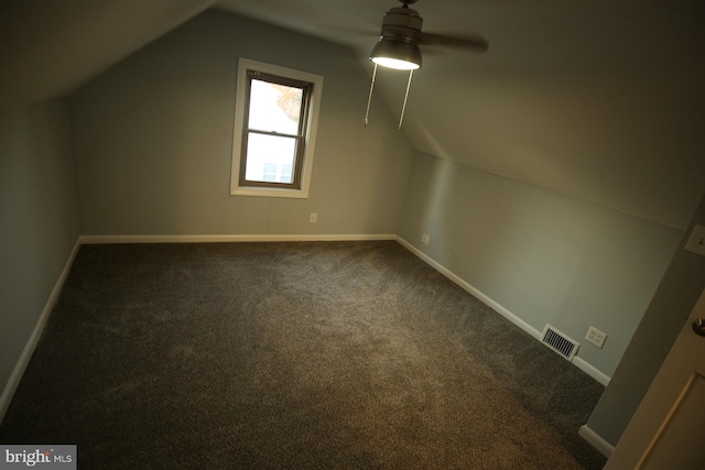 additional living space with ceiling fan, lofted ceiling, and carpet floors