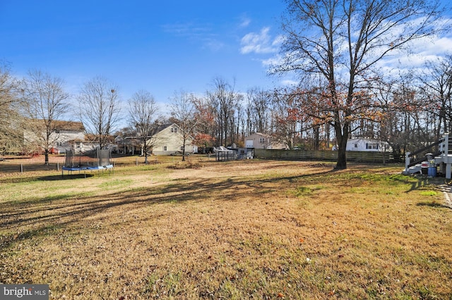 view of yard featuring a trampoline