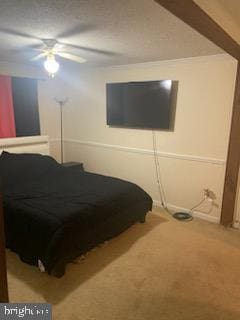 bedroom with ceiling fan and carpet floors