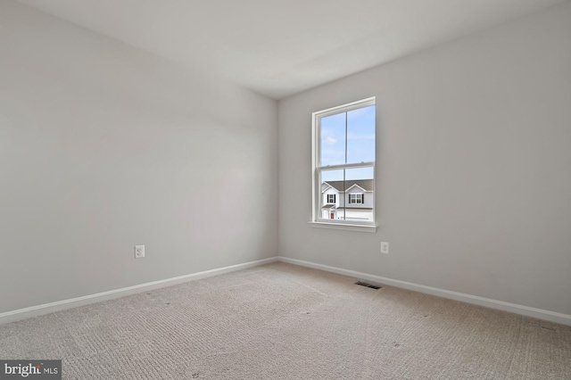 spare room with carpet flooring