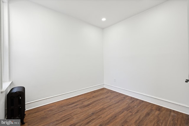 empty room featuring hardwood / wood-style floors