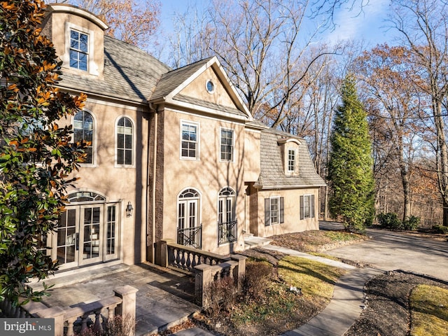 view of front facade featuring french doors