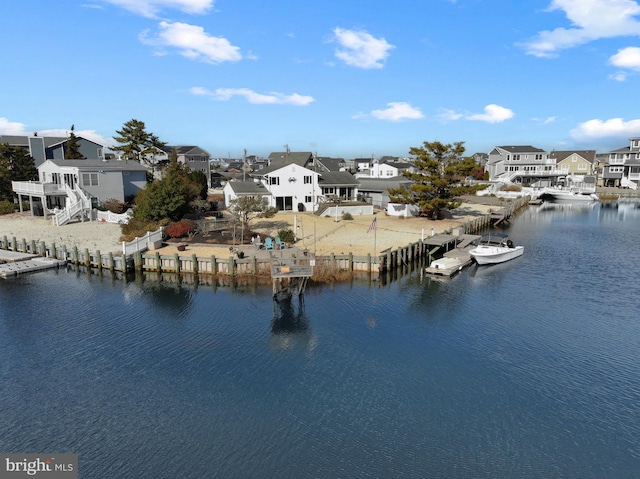 view of water feature with a dock