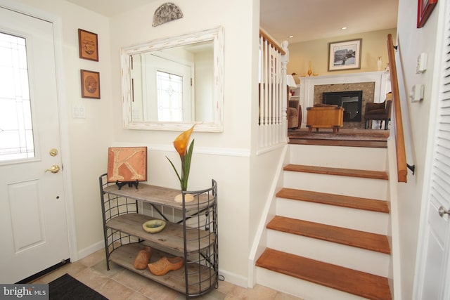 staircase featuring tile patterned flooring