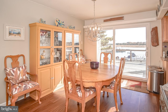 35 Walkill Rd, Little Egg Harbor Twp, NJ 08087 - dining room featuring a chandelier, wood finished floors, and a water view
