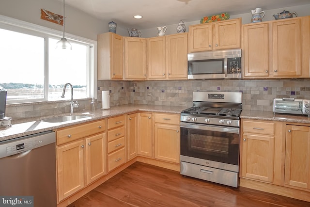 35 Walkill Rd, Little Egg Harbor Twp, NJ 08087 - kitchen with stainless steel appliances, light brown cabinetry, a sink, wood finished floors, and decorative backsplash