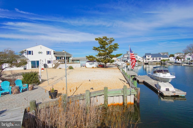 view of dock with a water view