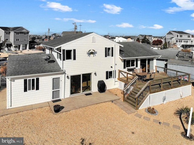 35 Walkill Rd, Little Egg Harbor Twp, NJ 08087 - rear view of property featuring roof with shingles, a wooden deck, a residential view, and a patio area