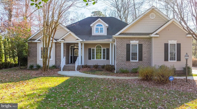 view of front of home with a front lawn