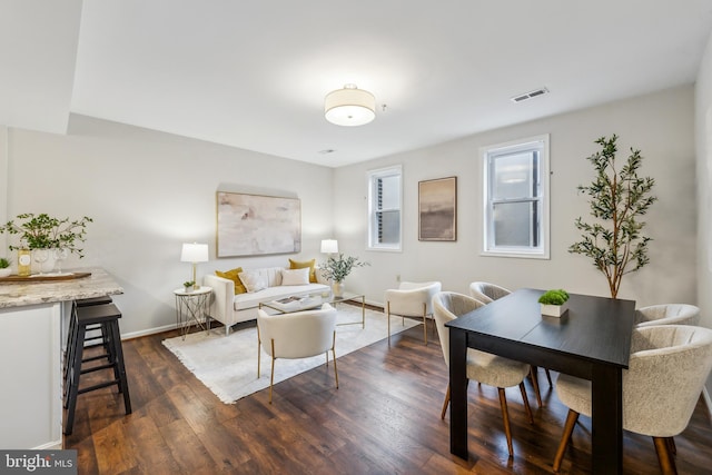 living room with dark hardwood / wood-style flooring