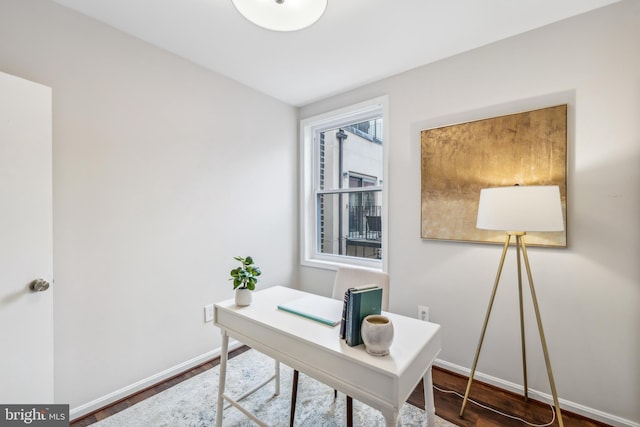 office area featuring dark wood-type flooring