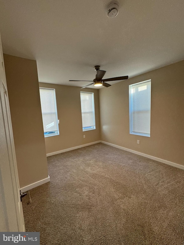 unfurnished bedroom with carpet floors and a textured ceiling