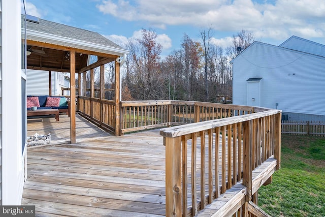 wooden terrace featuring a sunroom