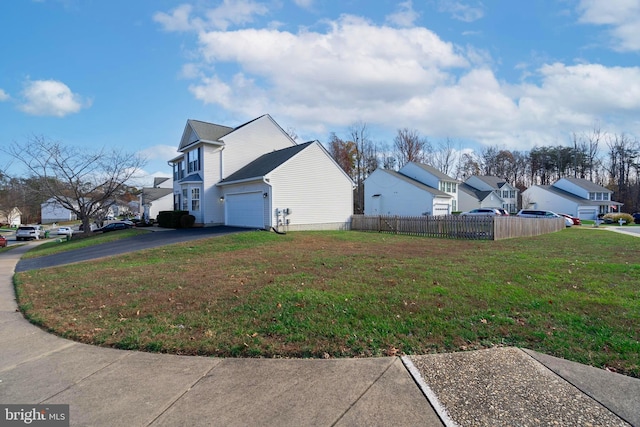 view of home's exterior featuring a lawn