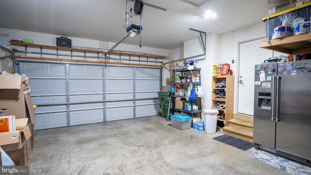 garage with high quality fridge and a garage door opener