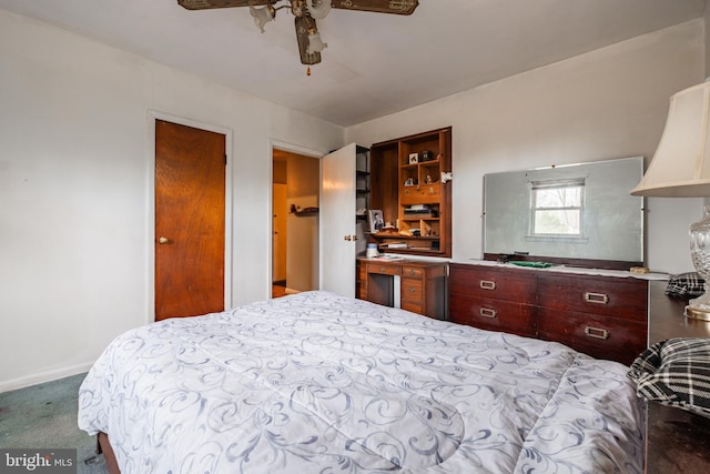 bedroom featuring ceiling fan and carpet floors