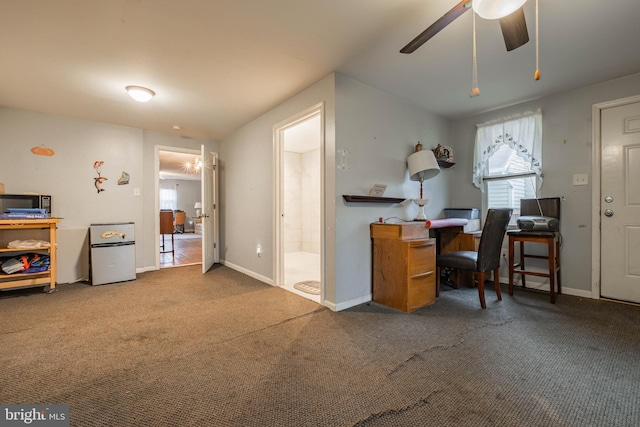 home office with ceiling fan and carpet floors