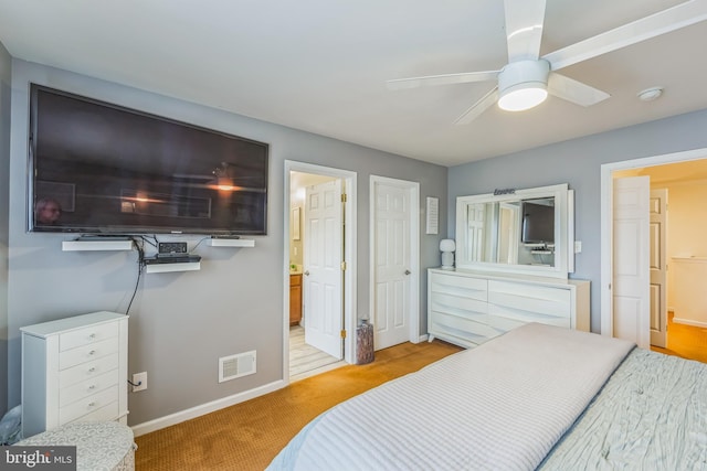 bedroom featuring ceiling fan and light colored carpet