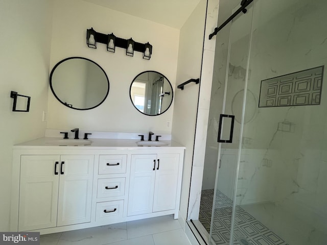 bathroom with vanity and an enclosed shower