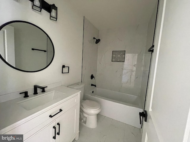 full bathroom featuring vanity, toilet, and tiled shower / bath